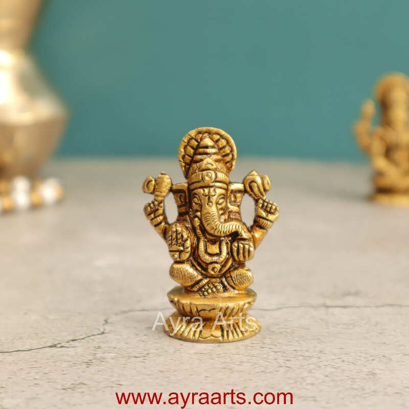 Elegant Brass Ganesha Idol - 2 Inch Height Elegant Brass Ganesha Idol - 2 Inch Height