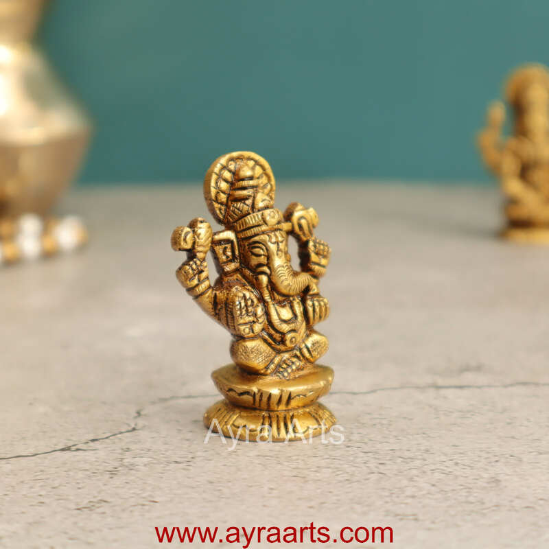 Elegant Brass Ganesha Idol - 2 Inch Height Elegant Brass Ganesha Idol - 2 Inch Height