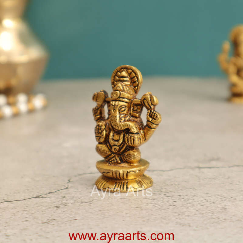 Elegant Brass Ganesha Idol - 2 Inch Height Elegant Brass Ganesha Idol - 2 Inch Height