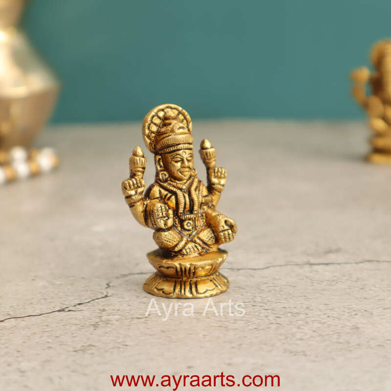 Elegant Brass Lakshmi Idol - 2 Inch Height Elegant Brass Lakshmi Idol - 2 Inch Height