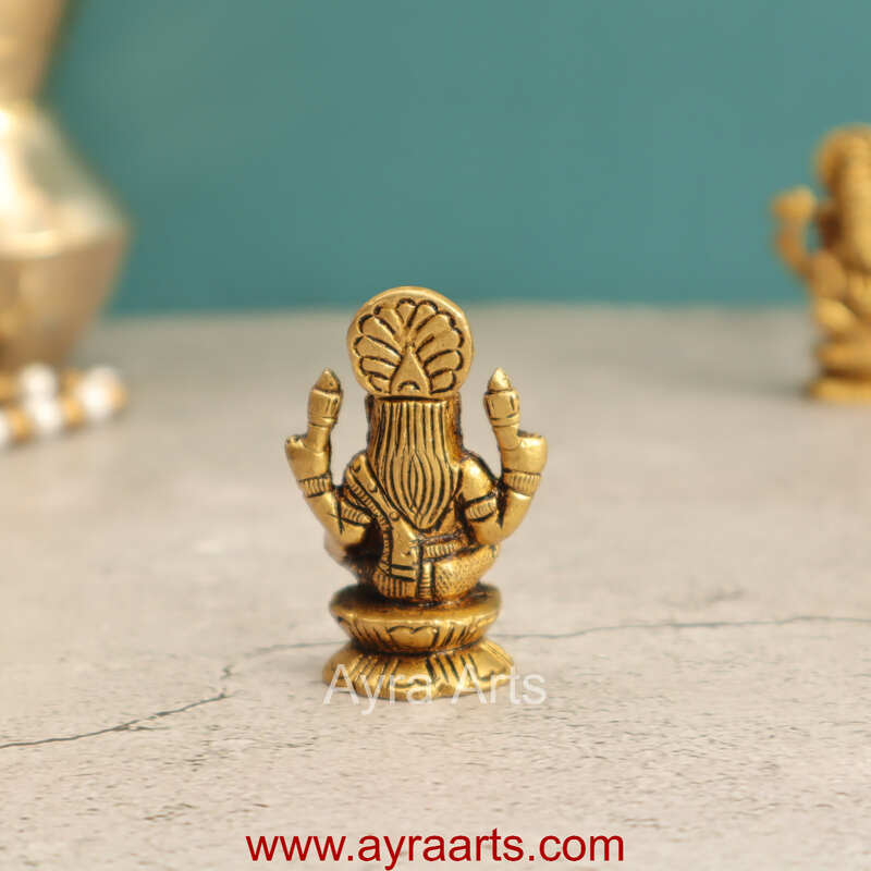 Elegant Brass Lakshmi Idol - 2 Inch Height Elegant Brass Lakshmi Idol - 2 Inch Height