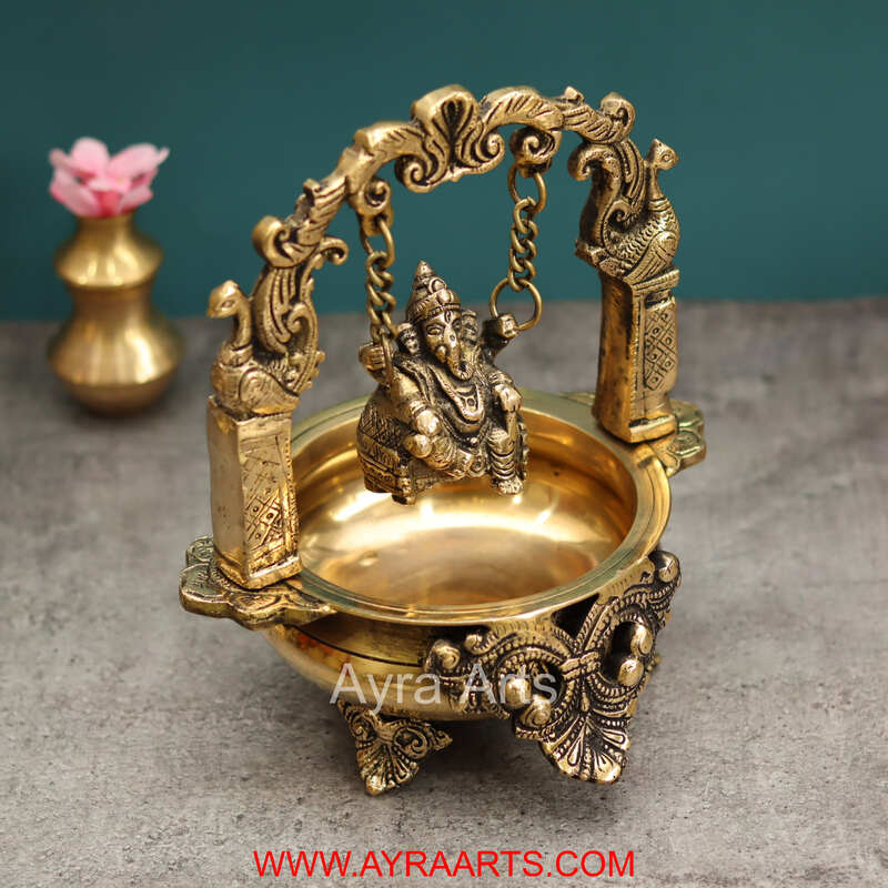 Brass Divine Ganesha Swinging on Urli Decorative Bowl for Pooja Home Decor - 9 Inch Height