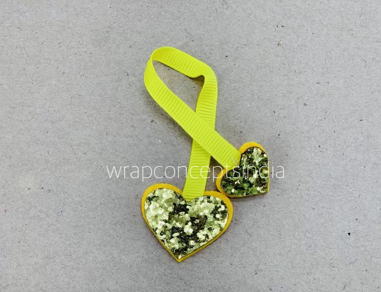 Two Hearts on a Ribbon - Yellow Two Hearts on a Ribbon - Yellow