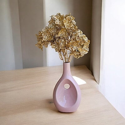Pink Ceramic Vase with Unique Cutout Design Pink Ceramic Vase with Unique Cutout Design
