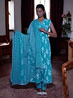 TURQUOISE FLORAL PRINT COTTON SALWAR SUIT SET - SLEEVELESS KURTA WITH MATCHING TROUSERS