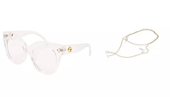 Soigné Female Oversized CatEye Spectacle Frame. Transparent Color with Golden Chain