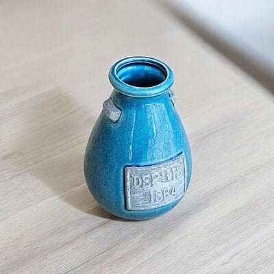 Blue Ceramic Vase with "Depuis 1884" Detail Blue Ceramic Vase with "Depuis 1884" Detail