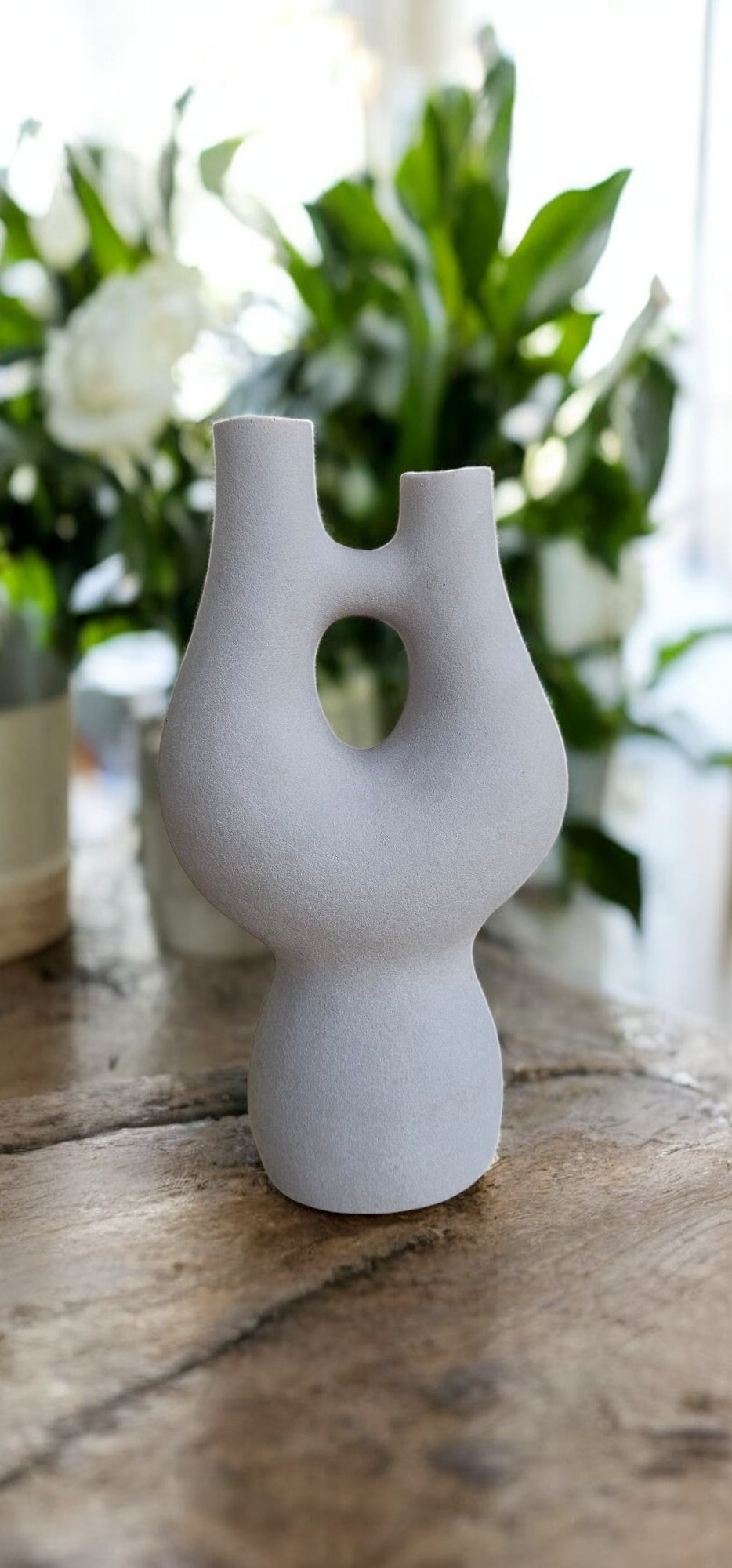 Grey Textured Ceramic Vase with Organic Shape and Cutout Grey Textured Ceramic Vase with Organic Shape and Cutout