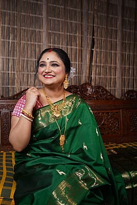 Heeran Green pure katan silk Swarnachari Heeran Green pure katan silk Swarnachari
