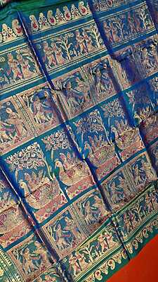 Color Blue green dual tone with golden colour zari Figure motif Swarnachari Color Blue green dual tone with golden colour zari Figure motif Swarnachari