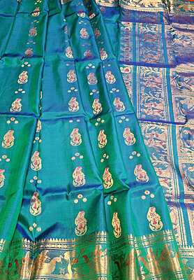 Color Blue green dual tone with golden colour zari Figure motif Swarnachari Color Blue green dual tone with golden colour zari Figure motif Swarnachari