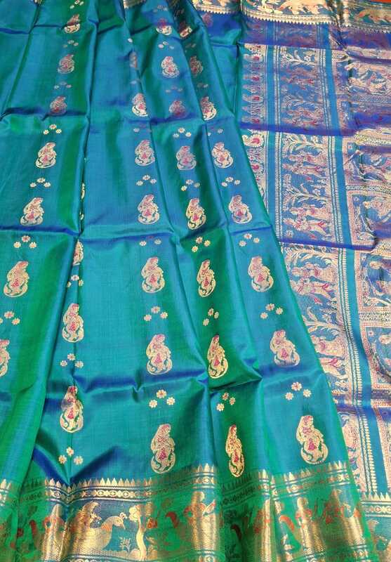Color Blue green dual tone with golden colour zari Figure motif Swarnachari Color Blue green dual tone with golden colour zari Figure motif Swarnachari