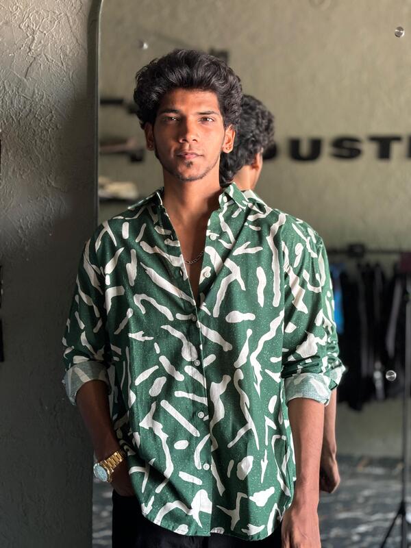 Green and white printed shirts Green and white printed shirts