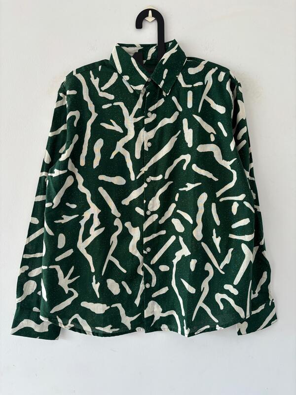 Green and white printed shirts Green and white printed shirts