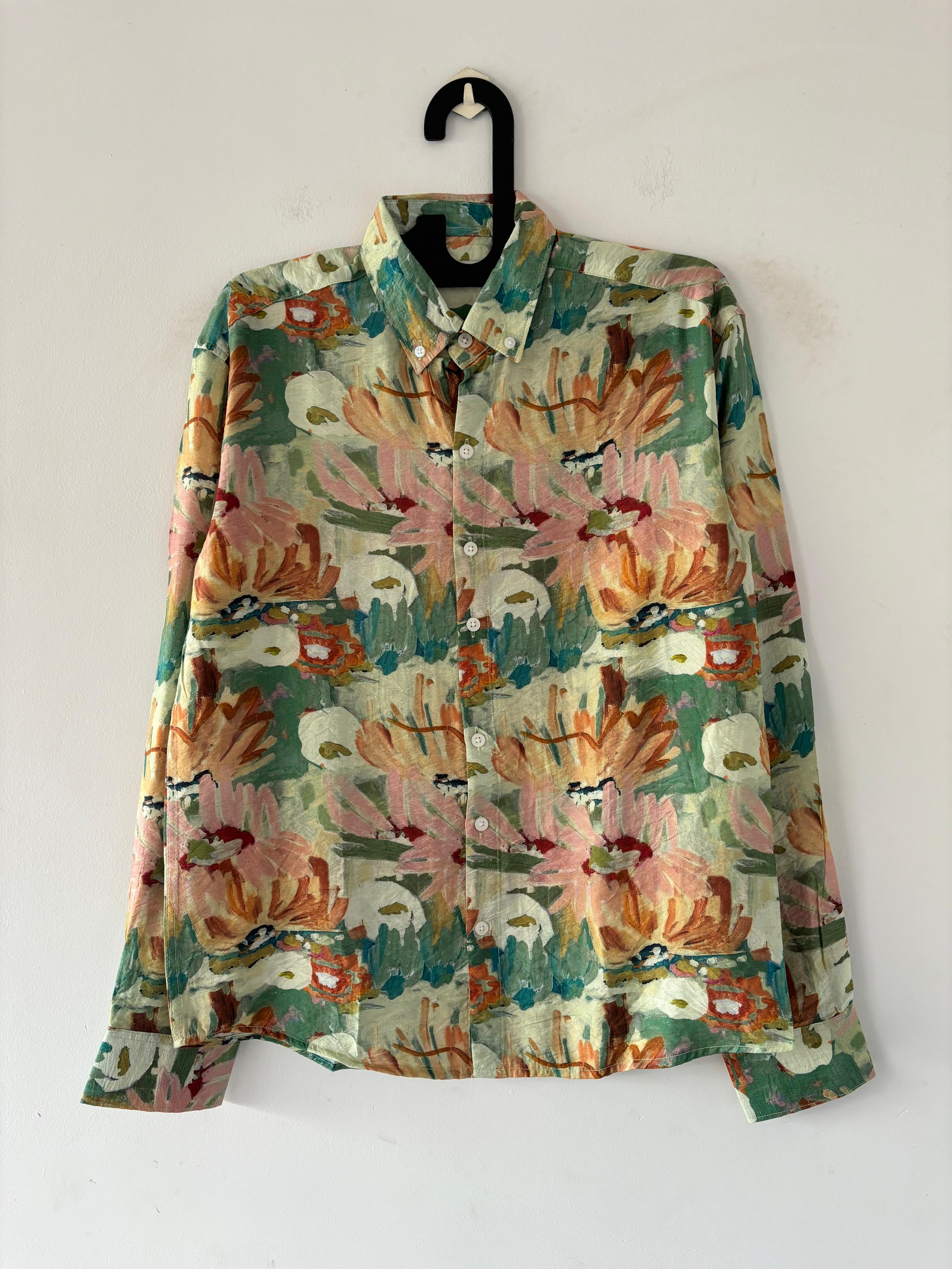Green and orange printed shirts Green and orange printed shirts