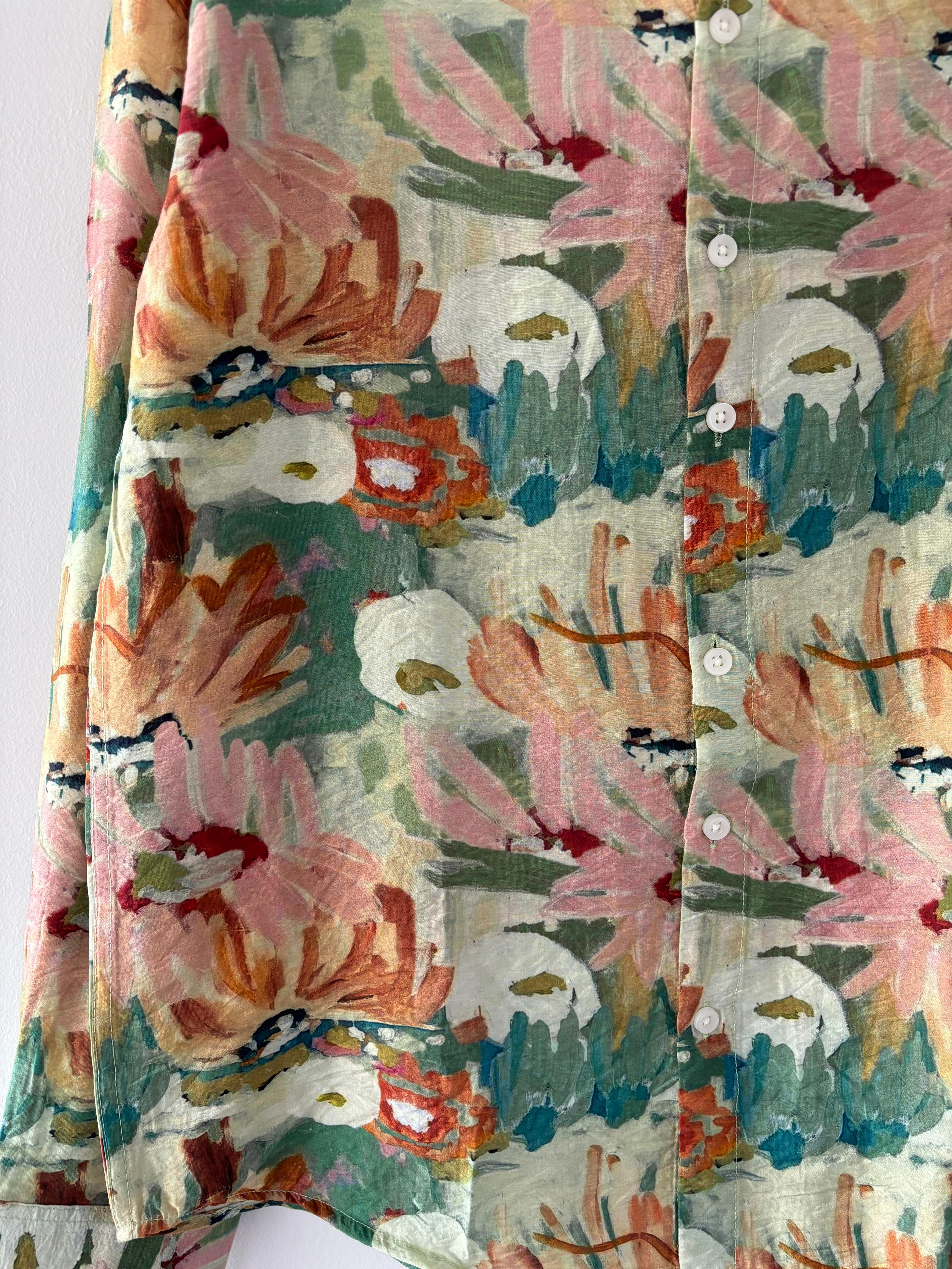Green and orange printed shirts Green and orange printed shirts