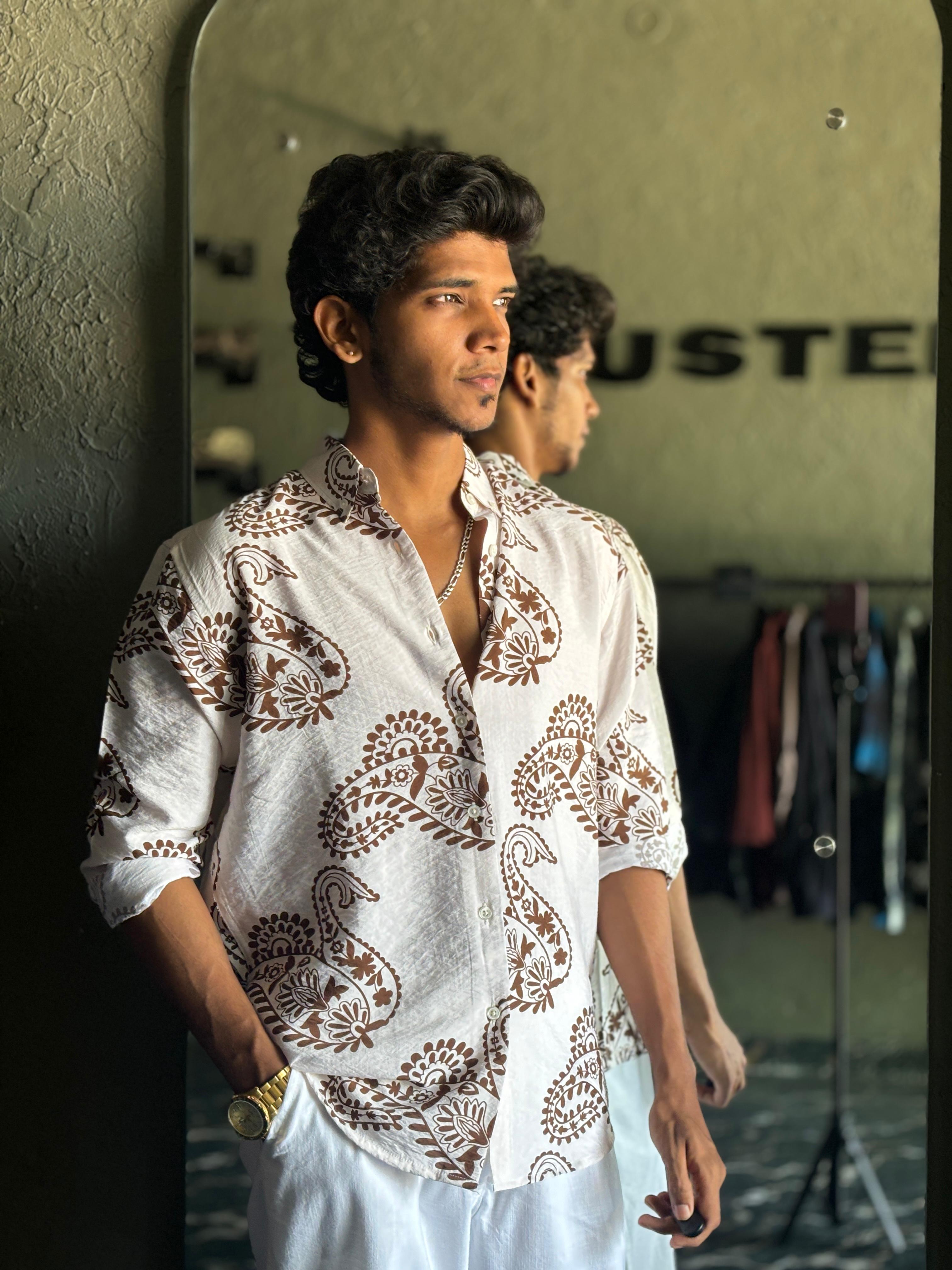 White and brown printed shirts White and brown printed shirts