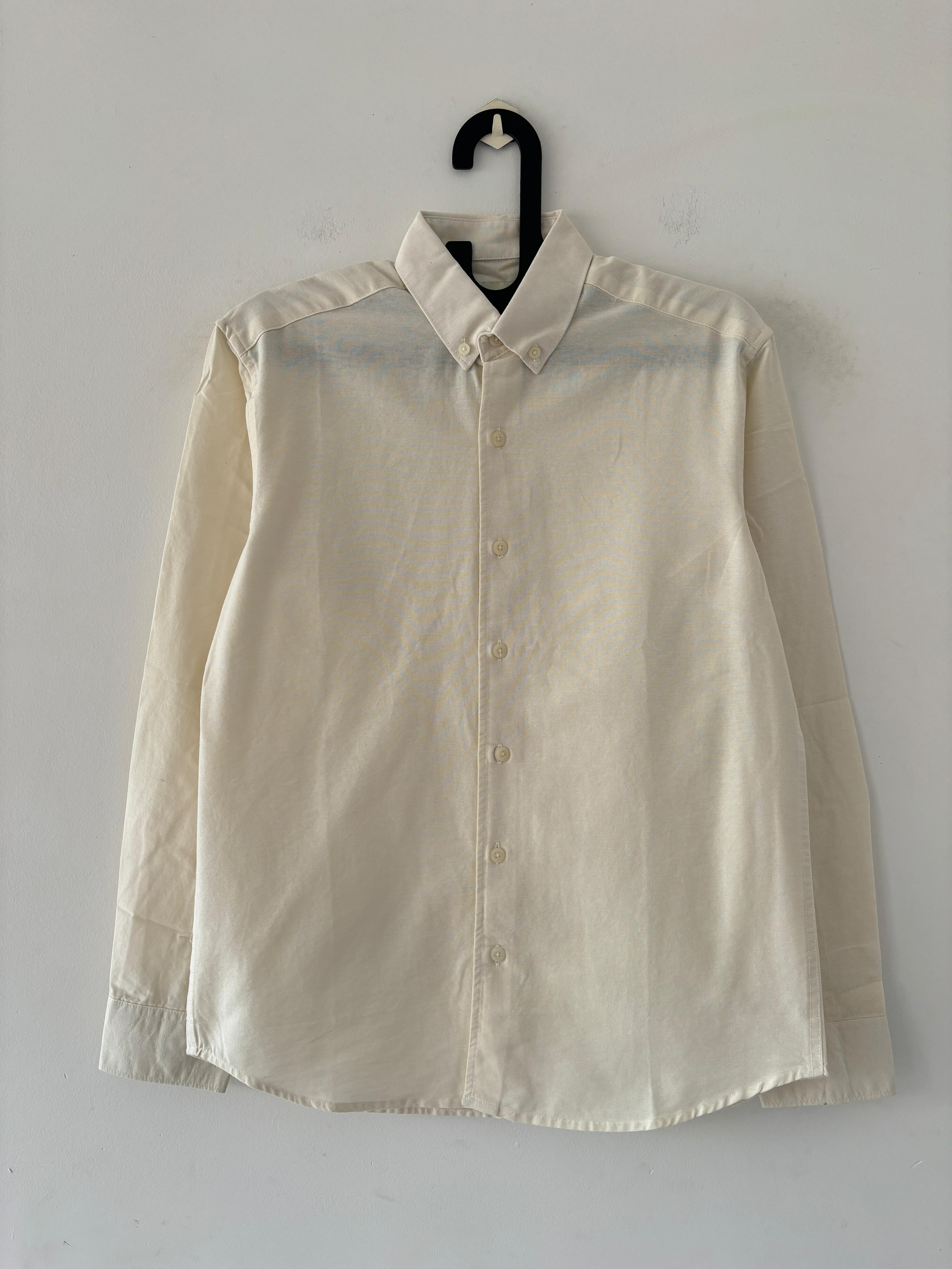 Cream solid shirt Cream solid shirt