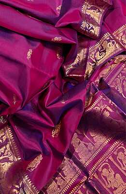 Blue Rani pink dual tone princess motif Swarnachari resham saree with golden zari Blue Rani pink dual tone princess motif Swarnachari resham saree with golden zari