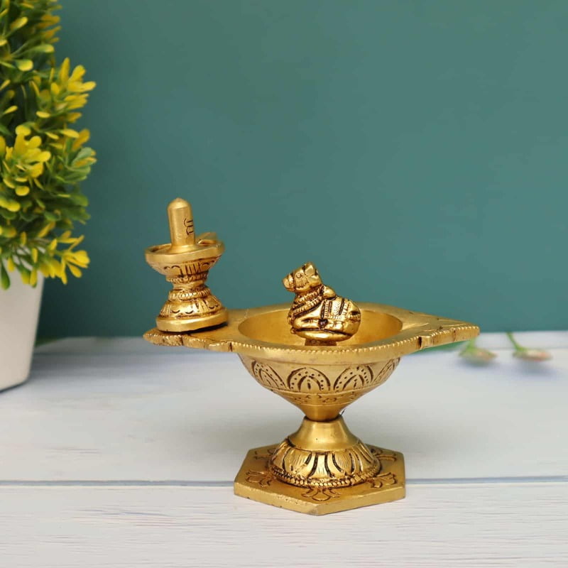 Brass Shivling Diya/Pradosha Deepam with Lingam and Nandhi/Vilakku - 4 inch Height | Sacred Brass Shivling Diya/Pradosha Deepam with Lingam and Nandhi/Vilakku Brass Shivling Diya/Pradosha Deepam with Lingam and Nandhi/Vilakku - 4 inch Height | Sacred Brass Shivling Diya/Pradosha Deepam with Lingam and Nandhi/Vilakku