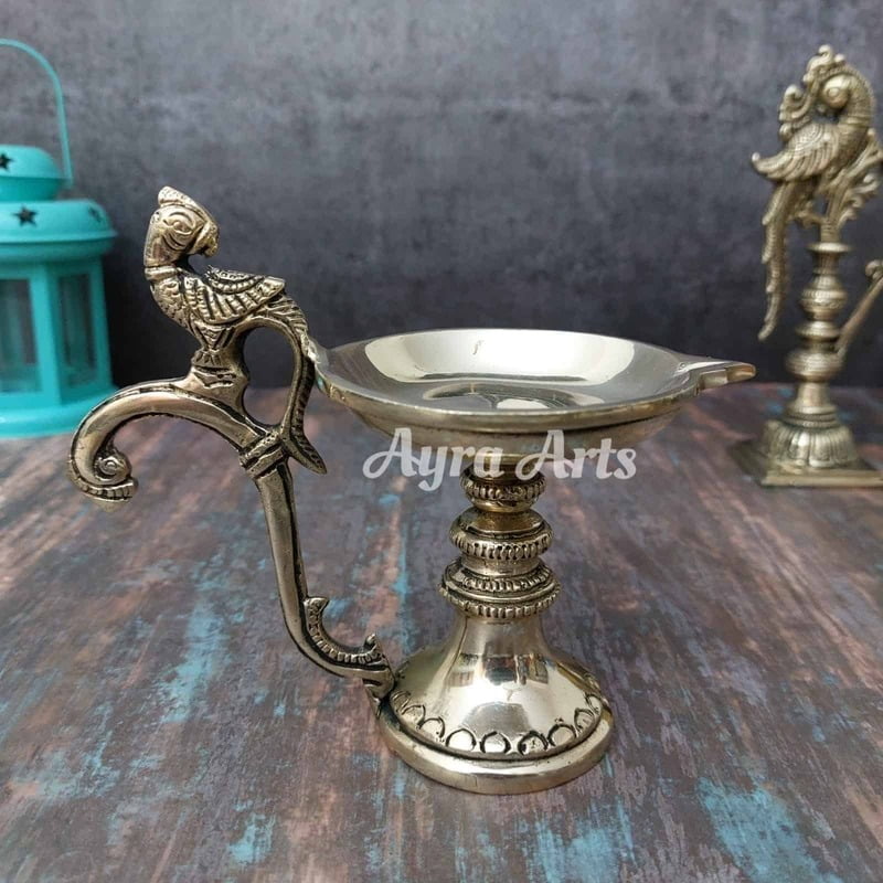 Brass Bird Handle Diya - 5 inch Height | Delicate and Charming Brass Bird Handle Diya - 5 inch Height | Delicate and Charming