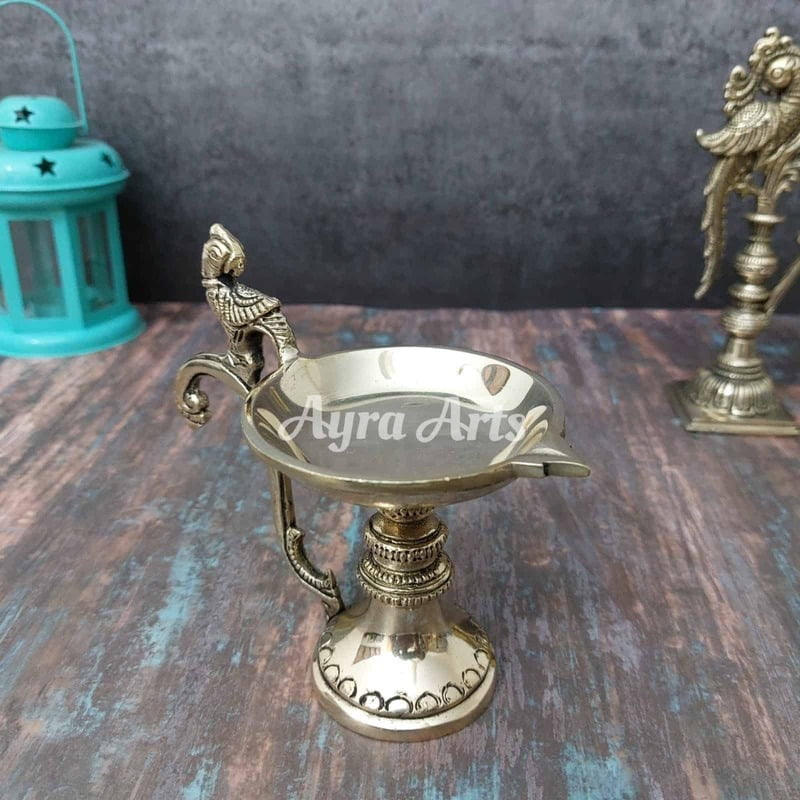 Brass Bird Handle Diya - 5 inch Height | Delicate and Charming Brass Bird Handle Diya - 5 inch Height | Delicate and Charming