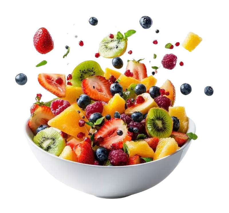 A ceramic bowl contains shattering fruits above that. A ceramic bowl contains shattering fruits above that.